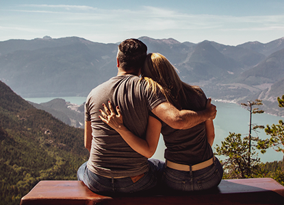 Xebex Experience all day wear couple overlooking mountain lake